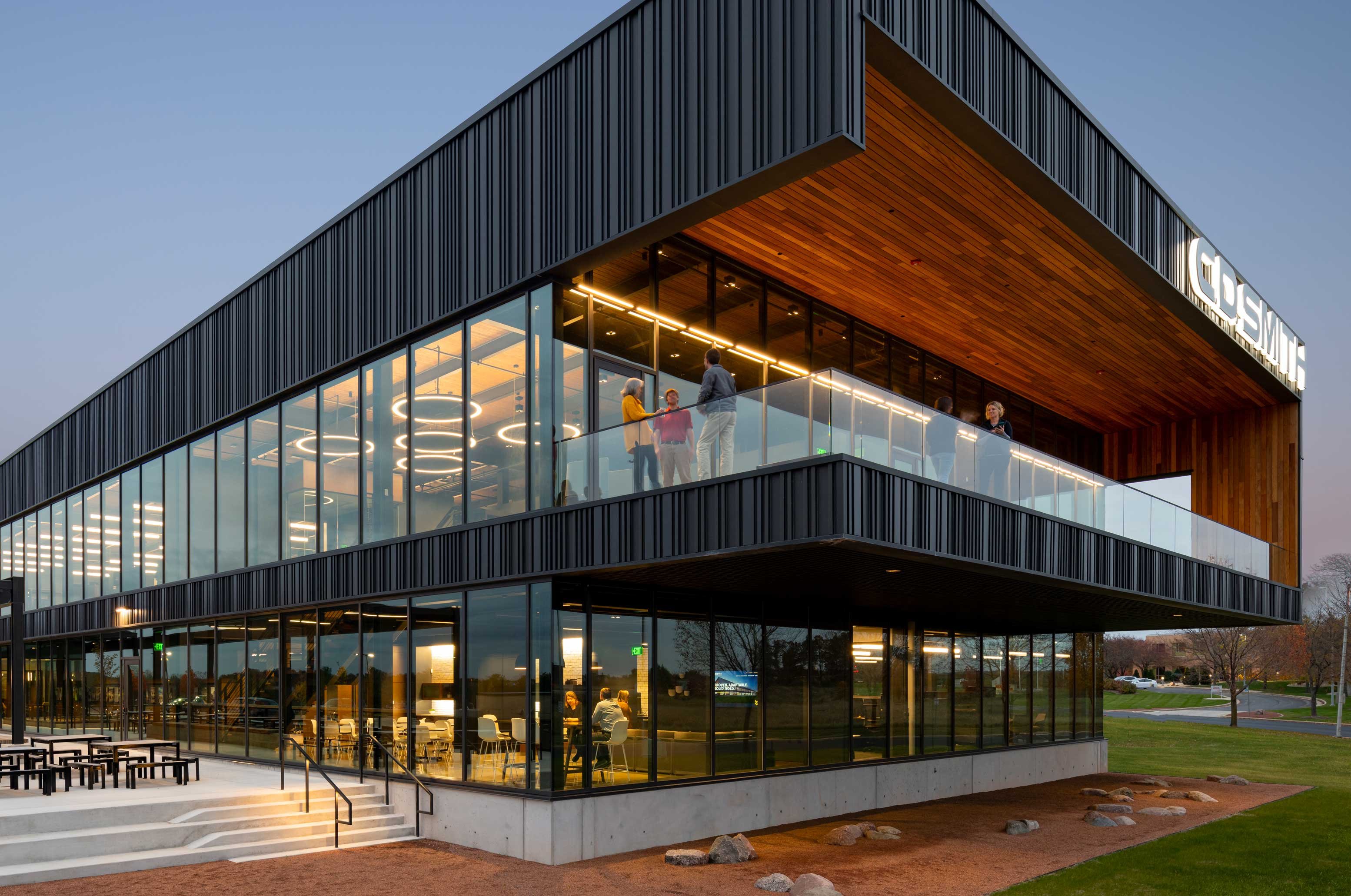 C.D. Smith Construction headquarters in Wisconsin featuring modern architecture with glass walls and wood accents, representing professional careers and company culture.