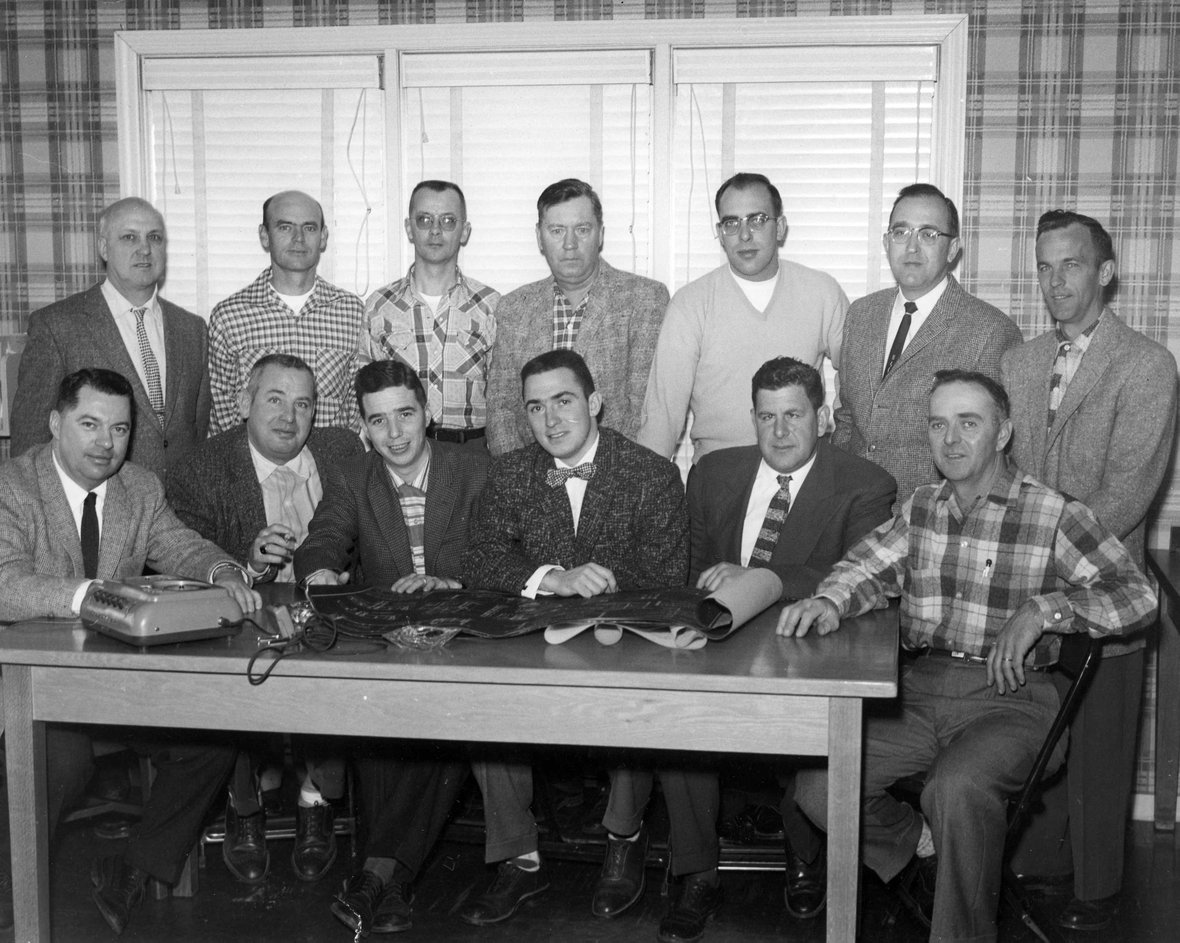 C.D. Smith Construction project managers and superintendents at a monthly Saturday morning meeting in 1957 including Tom Baker Sr. in Fond du Lac Wisconsin.