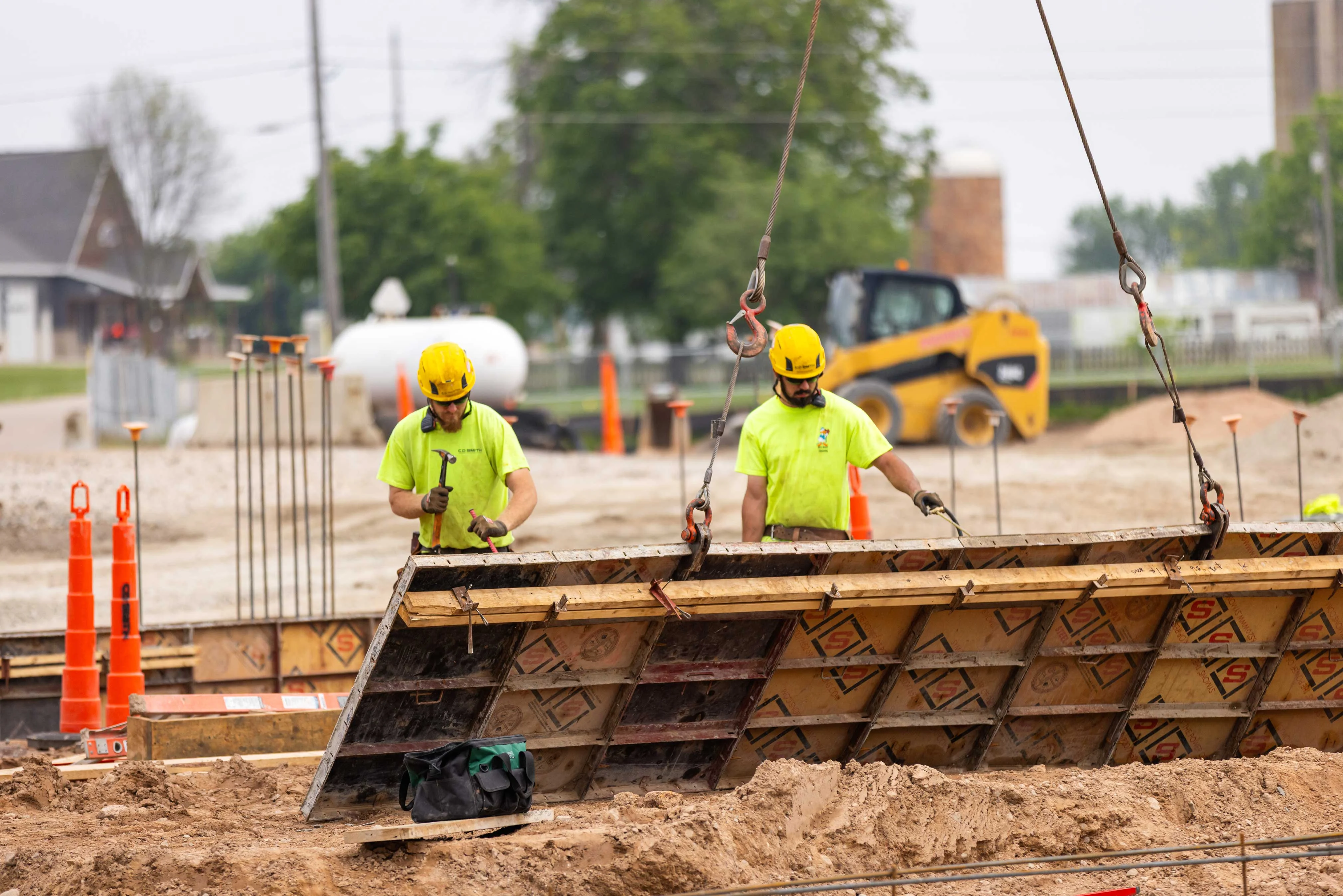 C.D. Smith construction crew working safely on a commercial jobsite in Wisconsin, representing field career opportunities in skilled trades.