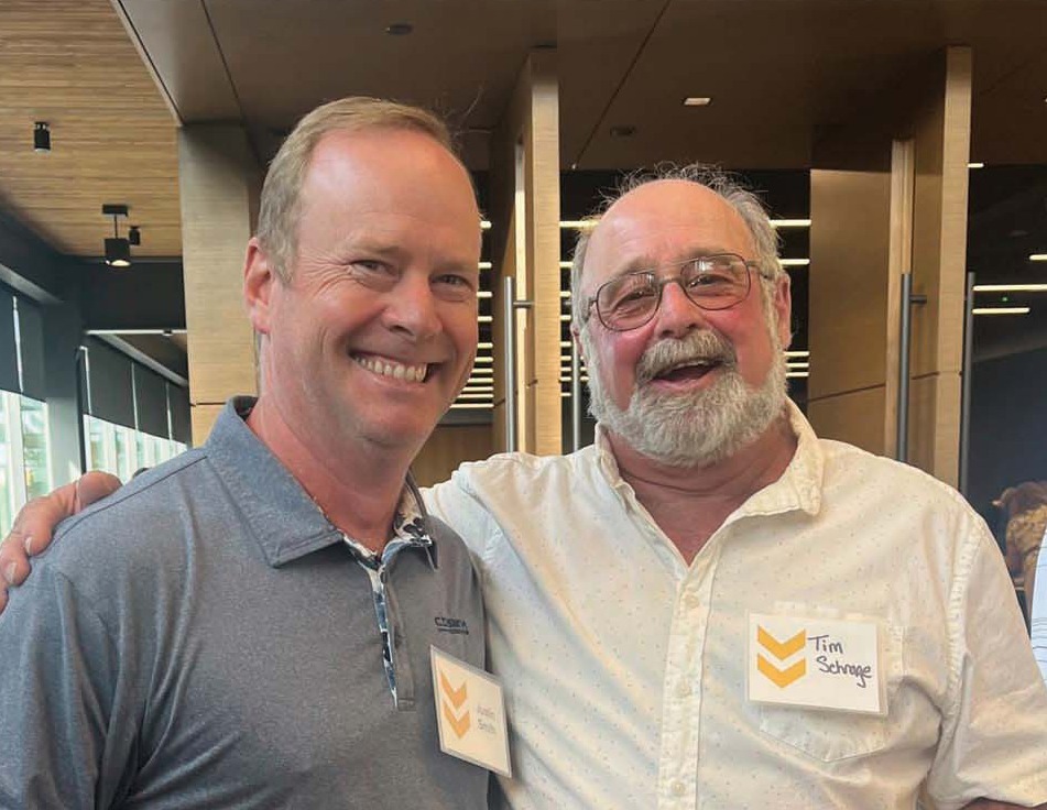 C.D. Smith Construction superintendents enjoying camaraderie and mentorship at the company’s 25-Year Service Event, representing experience and leadership.