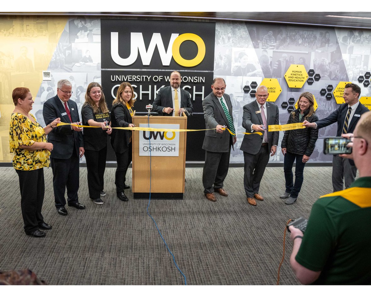 Rededication ceremony photo of those involved in University of Wisconsin-Oshkosh Clow Science Center and Nursing Education Building