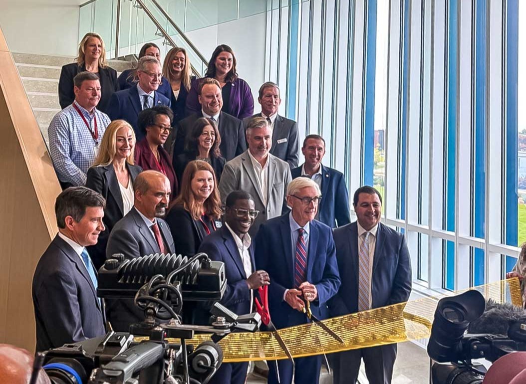 State, county and project leaders at the Forensic Science and Protective Medicine Facility ribbon cutting on Oct. 9, 2026.