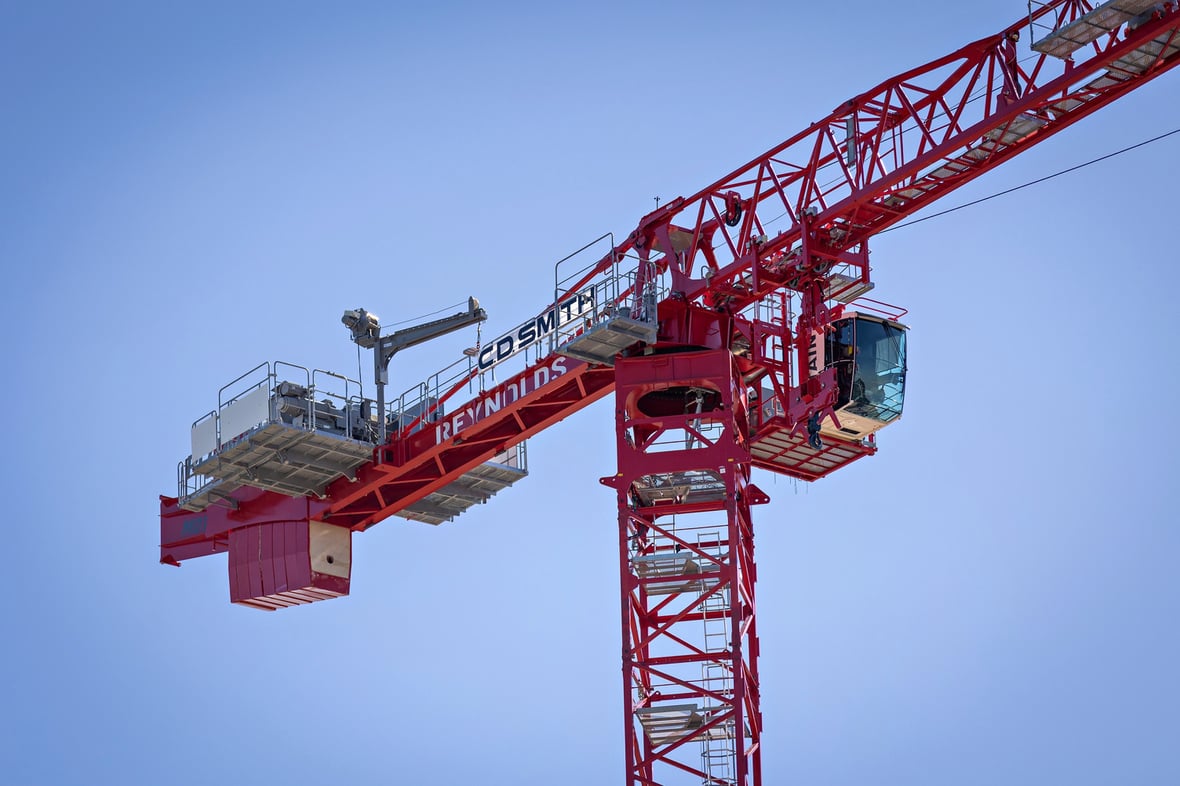Tower crane with C.D. Smith branding at the HSHS St. Mary's inpatient tower site in Green Bay.