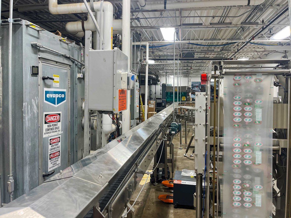 Completed industrial food processing equipment installed by millwrights inside a production facility