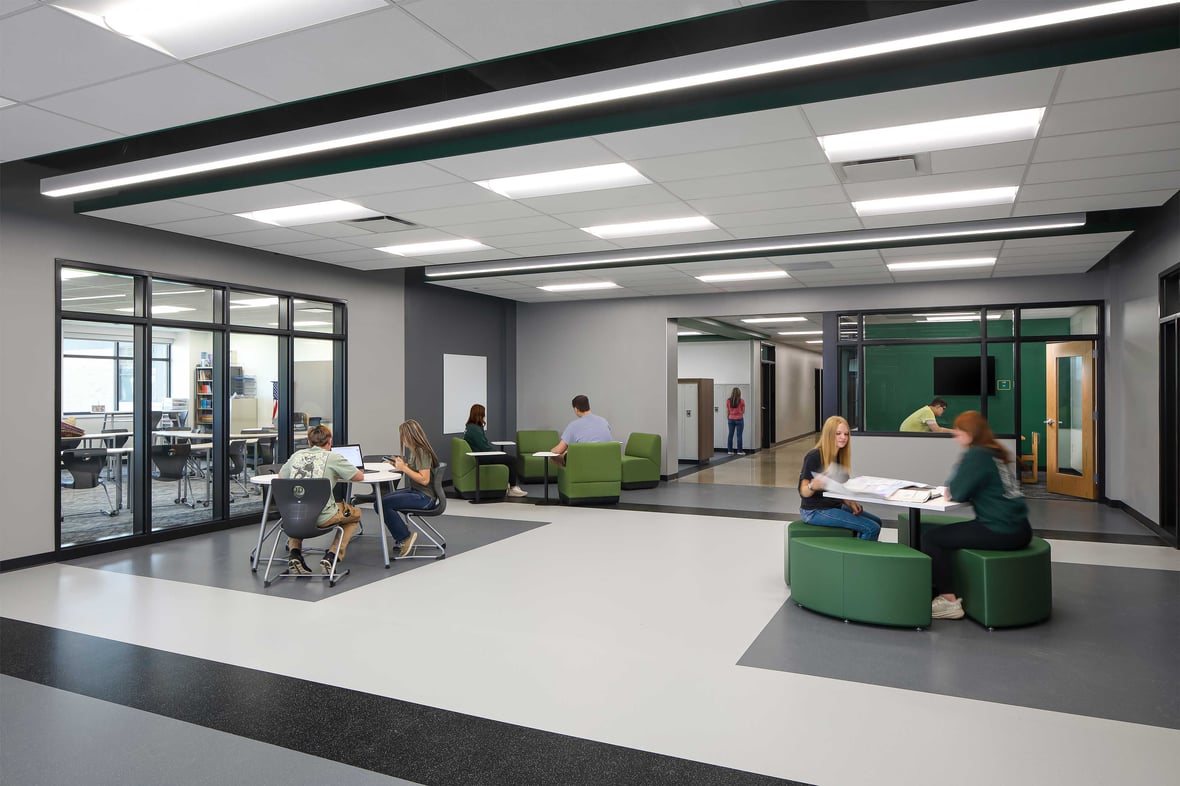 Students collaborate in a breakout space outside classrooms at Laconia Middle and High School.