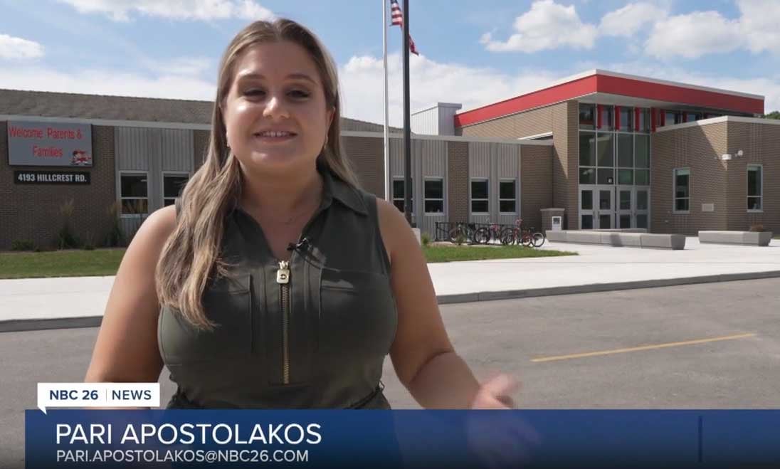 NBC26 reporter stands outside Hillcrest Elementary School in Pulaski, covering the first day of school after major renovations.
