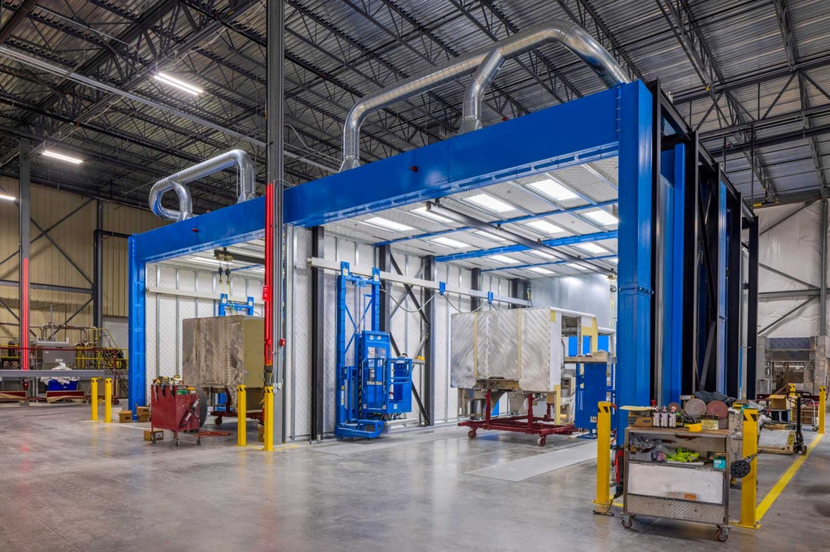 Paint booth bay with overhead ductwork at Pierce Manufacturing's expanded Appleton facility