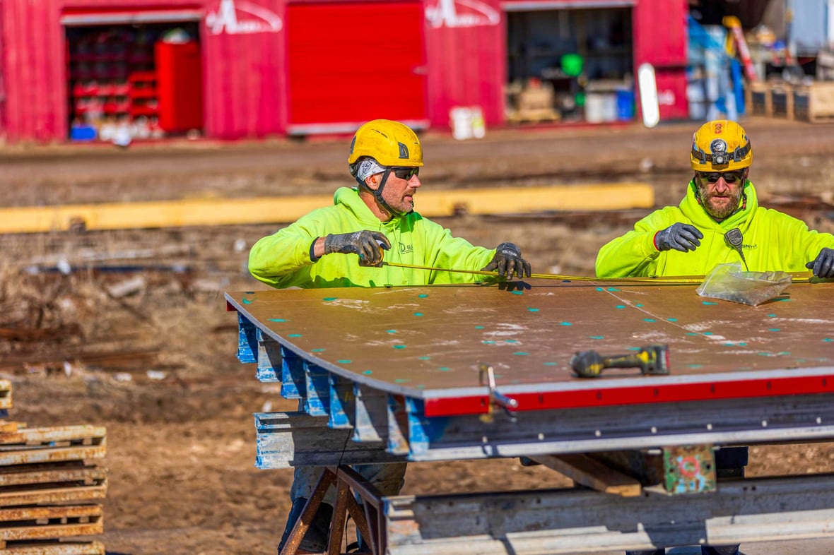 C.D. Smith Construction team prefabricating circular concrete formwork for treatment tanks at the Reedsburg Wastewater Treatment Plant.