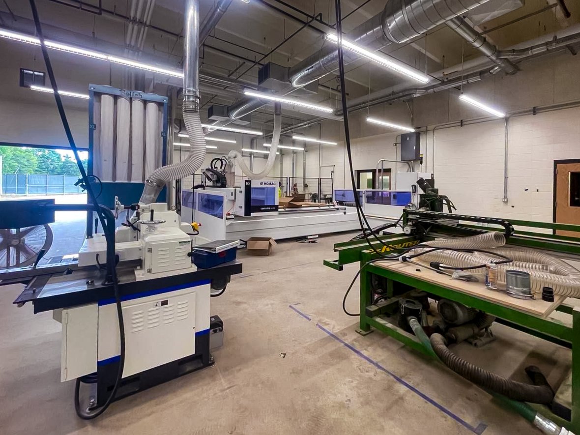Woods lab with a CNC router, dust collection and woodworking equipment at Rhinelander High School.