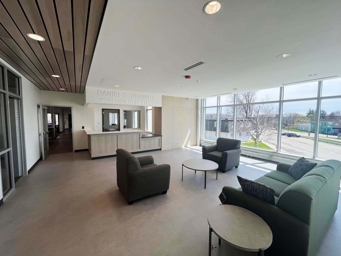 Upper-level lobby inside the Kewaskum municipal building, showcasing efficient layout and daylighting in public architecture.