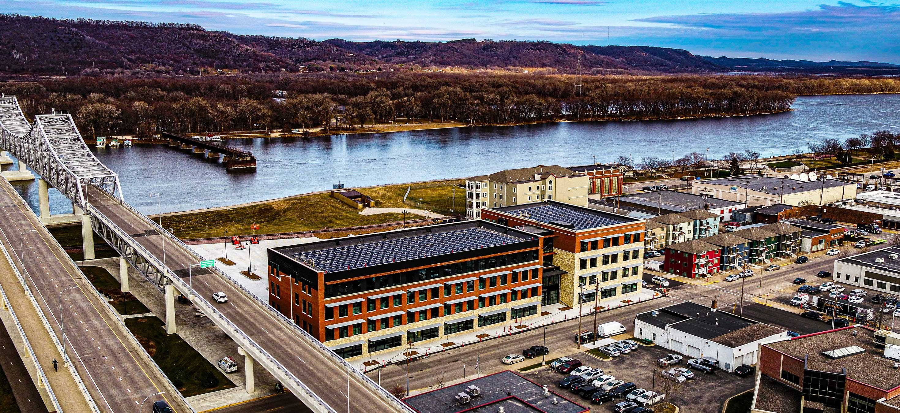 C.D. Smith Construction Manager for Fastenal Corporate Office Mass Timber Building Exterior with River in Background