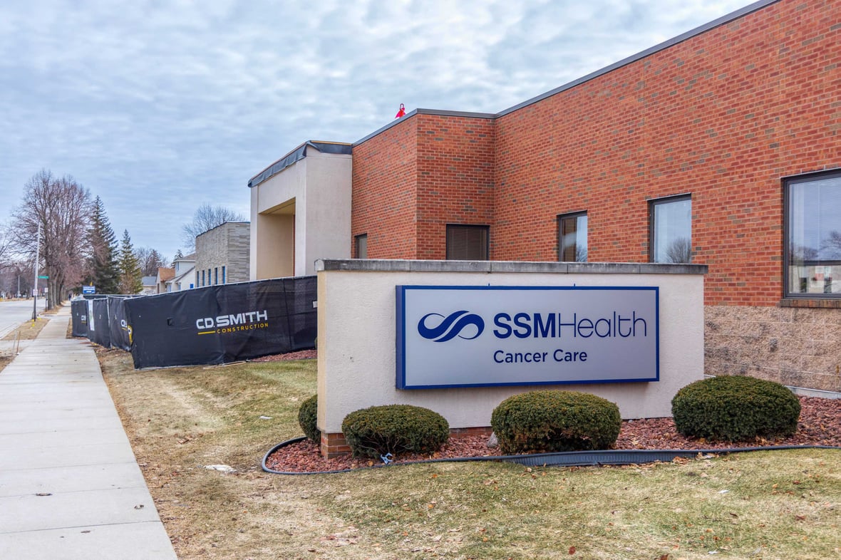 SSM Health Cancer Care expansion project along Eastgate Place in Fond du Lac during active construction near neighboring residences.
