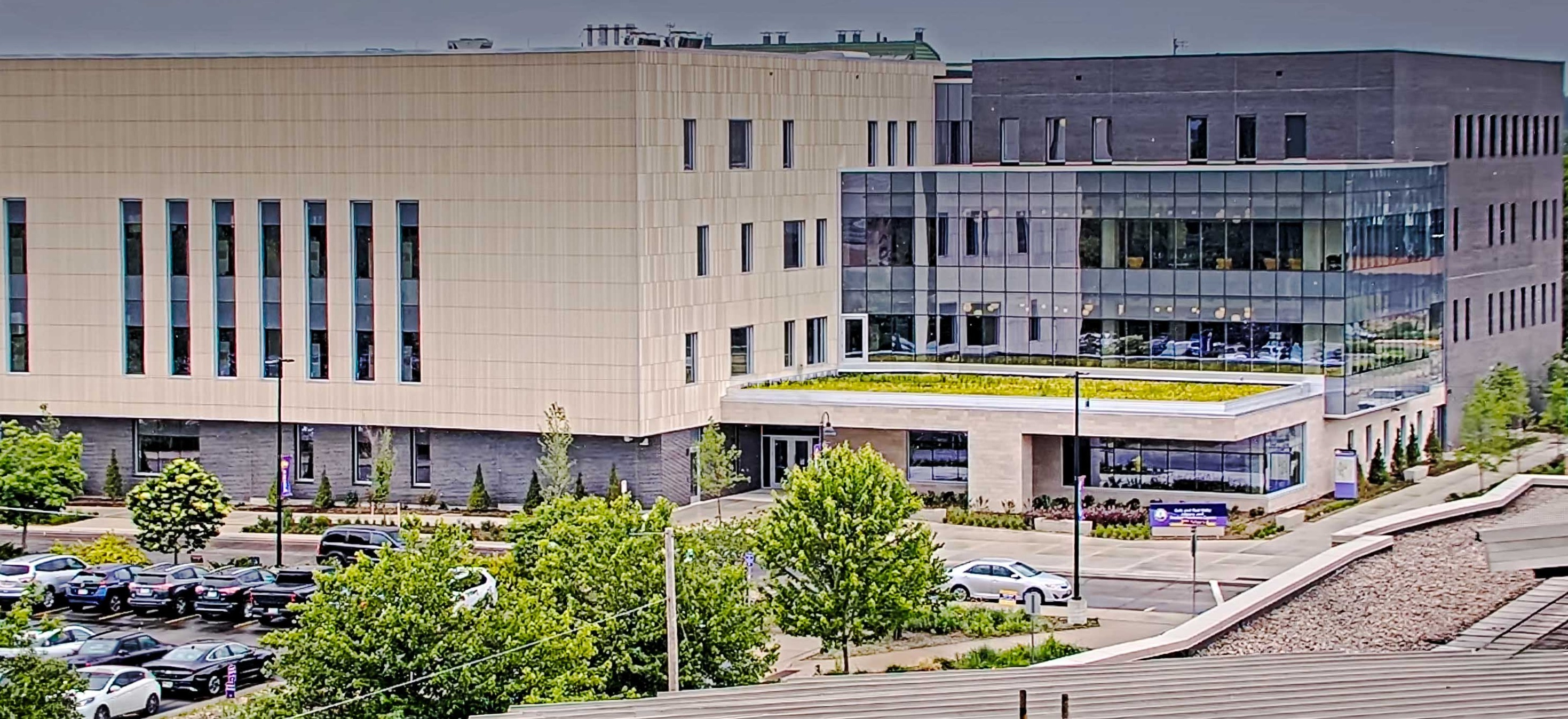 Completed exterior view of the Gale and Paul Kirby Library and Student Resource Center at UW-Stevens Point featuring glass curtain wall systems, academic spaces and campus gathering areas.