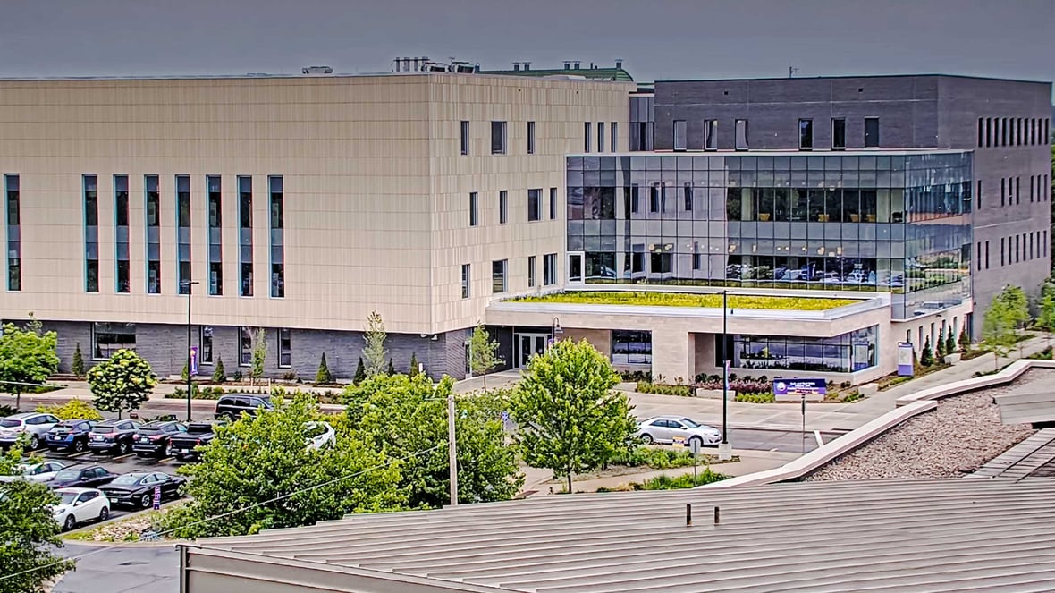 Completed exterior view of the Gale and Paul Kirby Library and Student Resource Center at UW-Stevens Point featuring glass curtain wall systems, academic spaces and campus gathering areas.