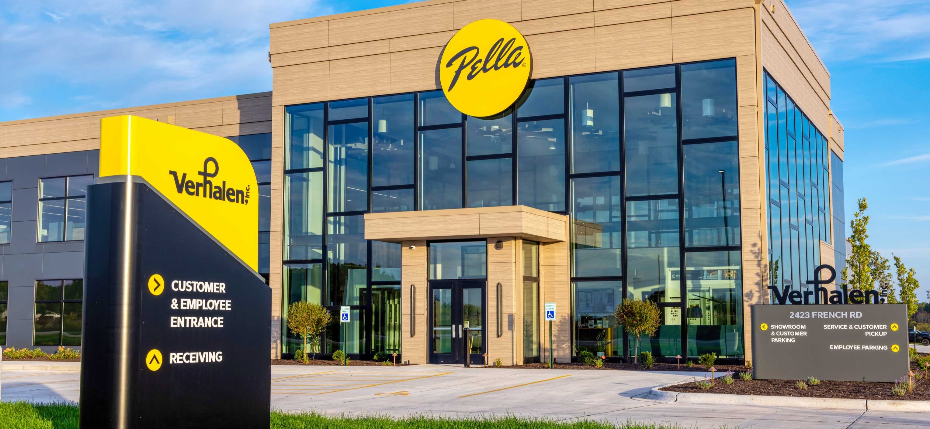 VerHalen Inc. industrial headquarters and warehouse in Lawrence, Wisconsin featuring office space, expanded warehouse capacity and Pella storefront signage constructed by C.D. Smith Construction.