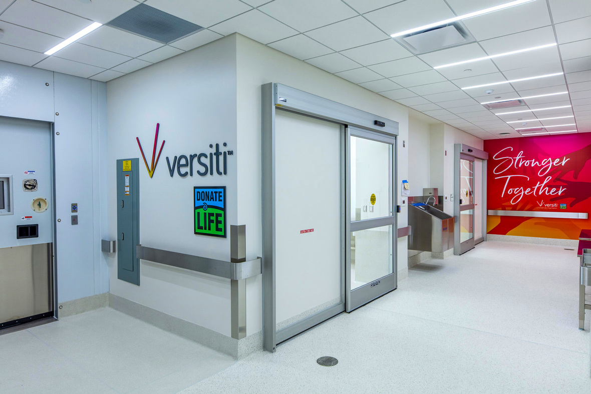 Interior corridor with Versiti signage inside the Forensic Science and Protective Medicine Facility.