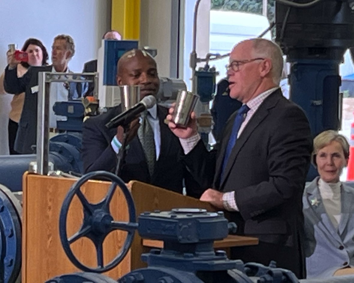 Waukesha Mayor Shawn Reilly and Milwaukee Mayor Cavalier Johnson celebrate the Waukesha Water Utility construction project completion